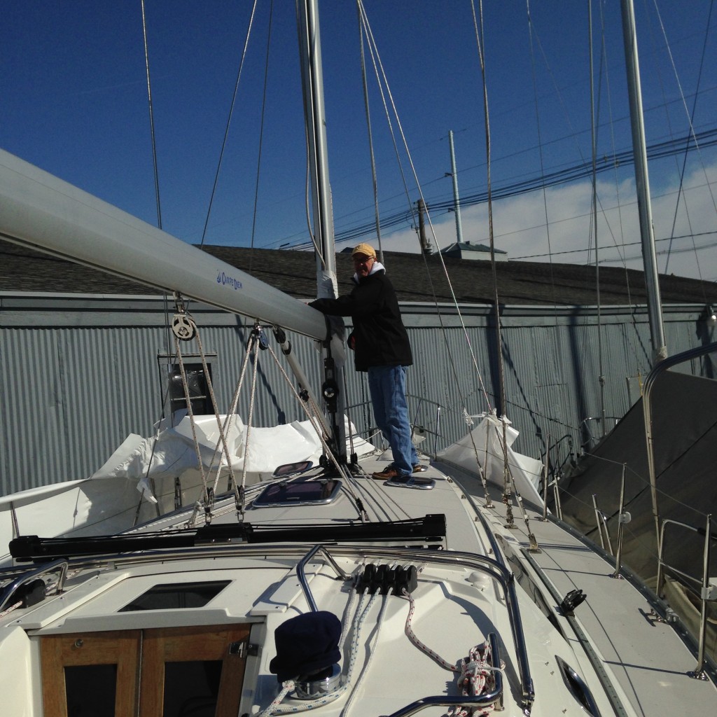 Gary trimming some excess plastic around the mast.