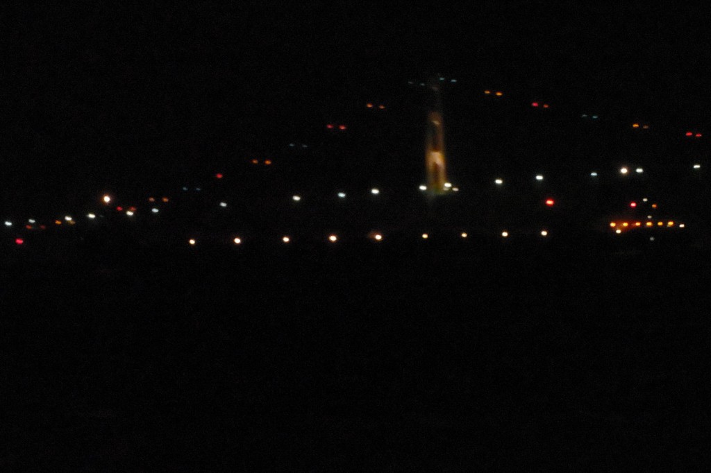This is a really poor photo, but you can kind of make out the silhouette of the freighter against the Mackinac bridge if you look towards the waterline (wheelhouse is to the right). Just for perspective, the spacing between each one of those lights on this ship is roughly the length of our boat.