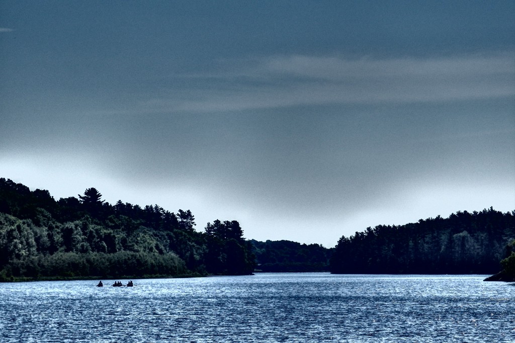 Three canoes full of high school aged guys making their way towards Kallarney. 